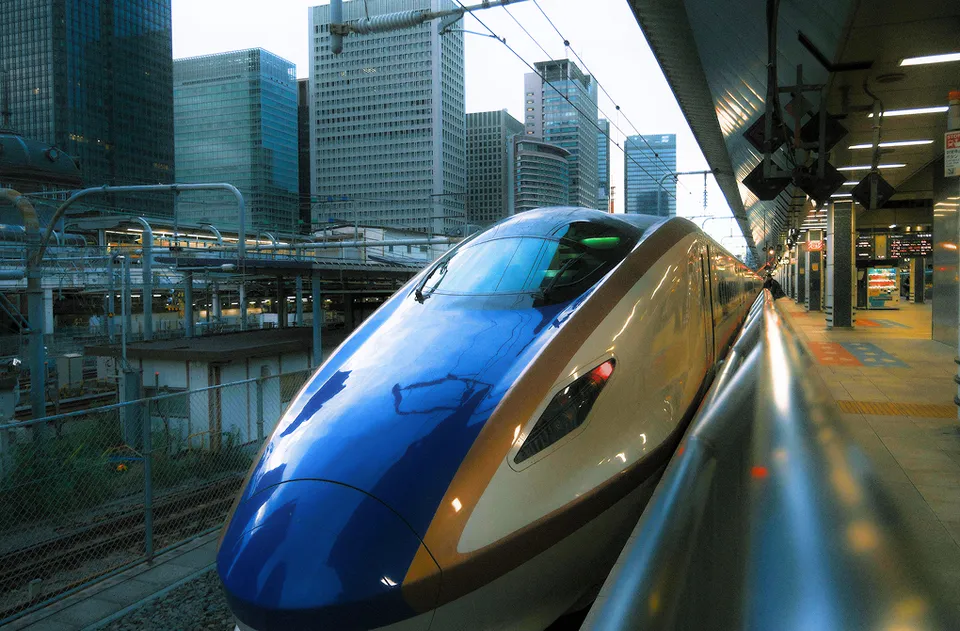 High-speed train in an urban rail station