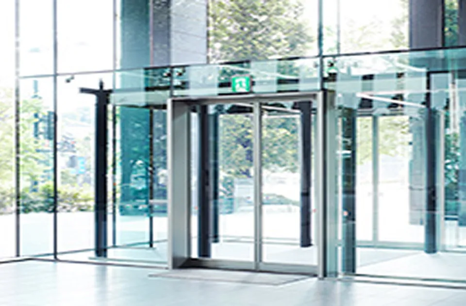 Automatic sliding glass doors in a modern building
